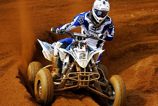 Holmes Dominates QX Opener