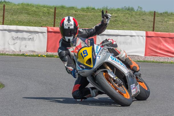 Shelley Lifts the Curtis Milner Trophy