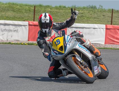 Shelley Lifts the Curtis Milner Trophy