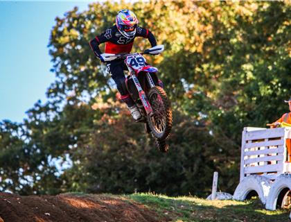 Parker seals the title with a brilliant hat trick